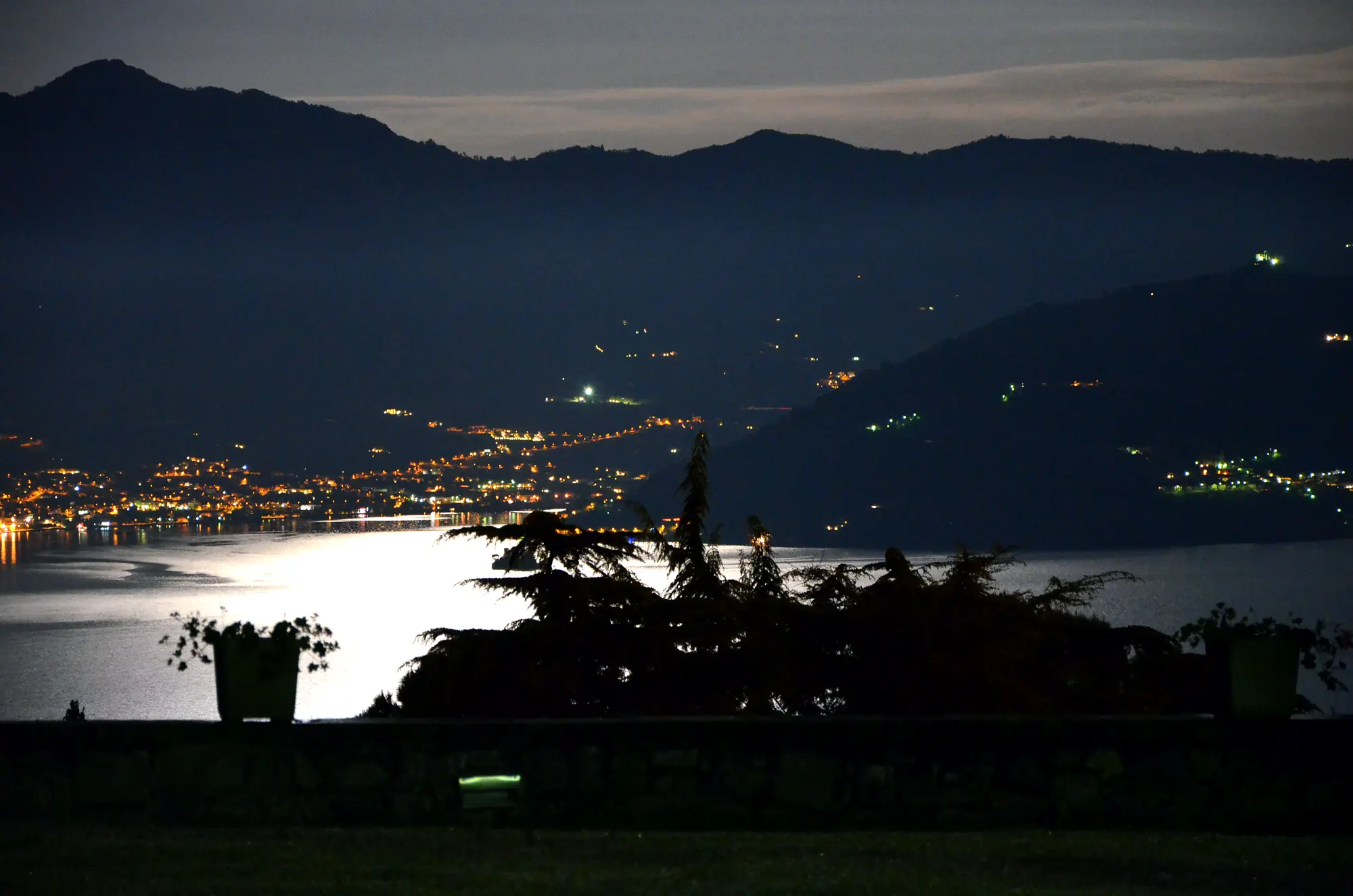 Lake Iseo at night, with the lights of the villages
