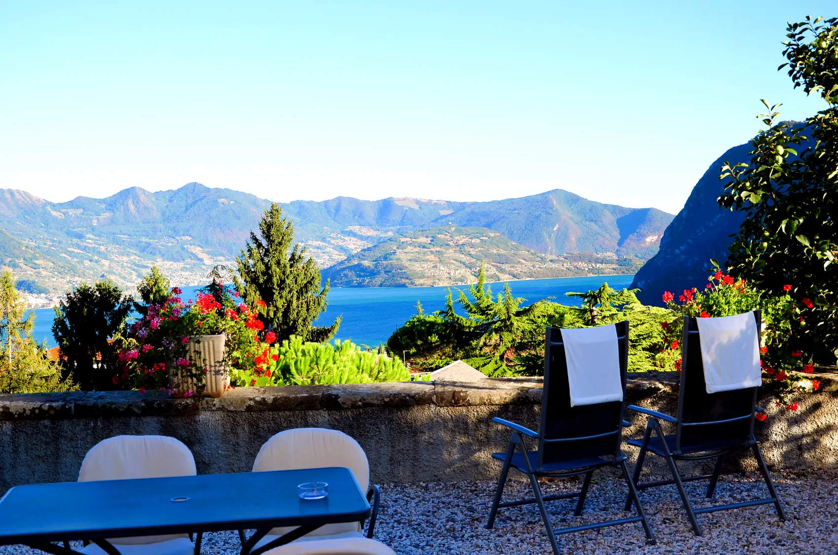The tables on the sun terrace, overlooking the lake